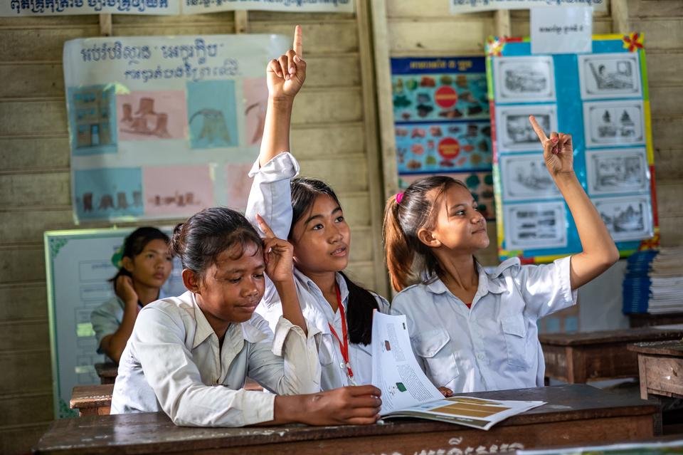 Sreyvatey, 14, at her school on Tonle Sap Lake, Cambodia.