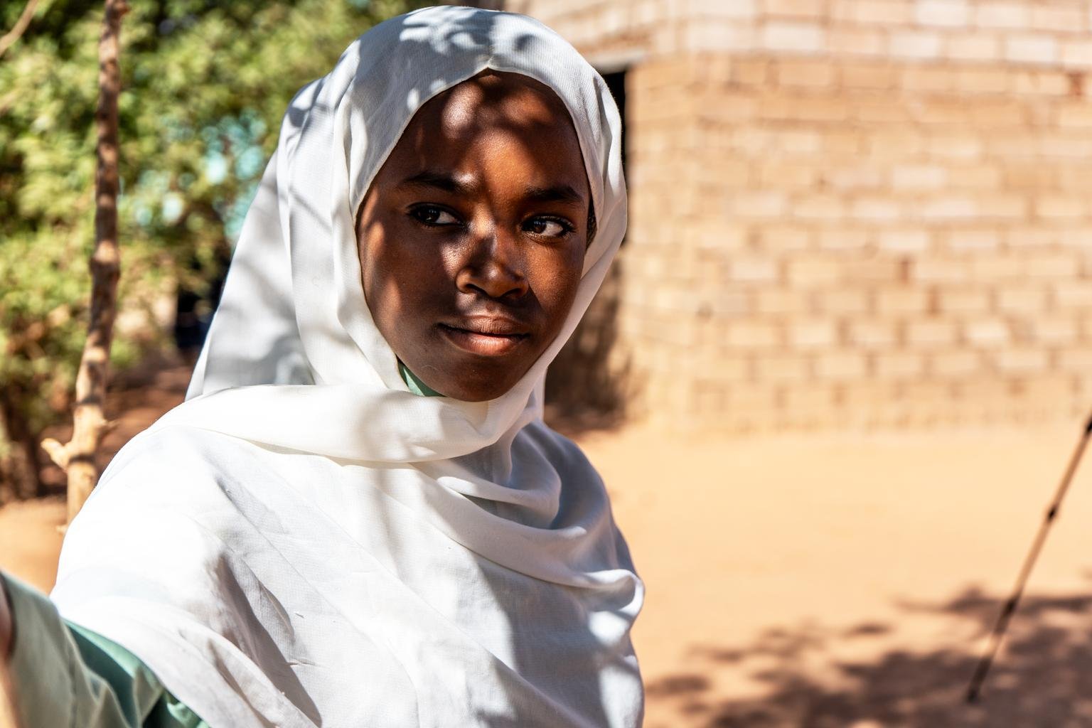 Portrait of Alaa* taken outside her school in Omdurman, Khartoum State