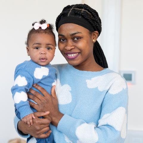 Joy* with her 9 month old twin daughter Mitchell*, at Home-Start Edinburgh.
