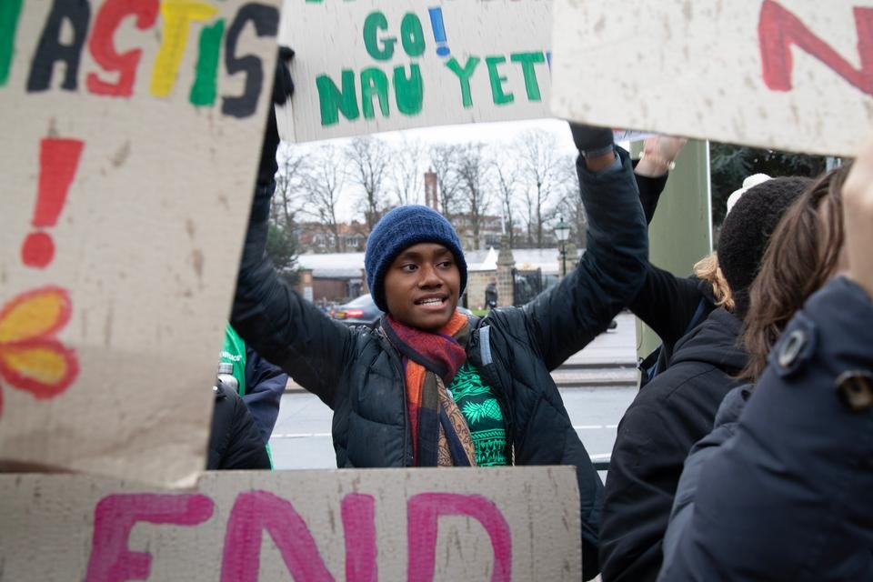Vepaiamele, 15, takes part in a climate demonstration outside the Peace Palace in The Hague, Netherlands.