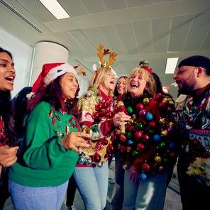 Workplaces take part in SCUK 2024 Christmas Jumper Day photoshoot
