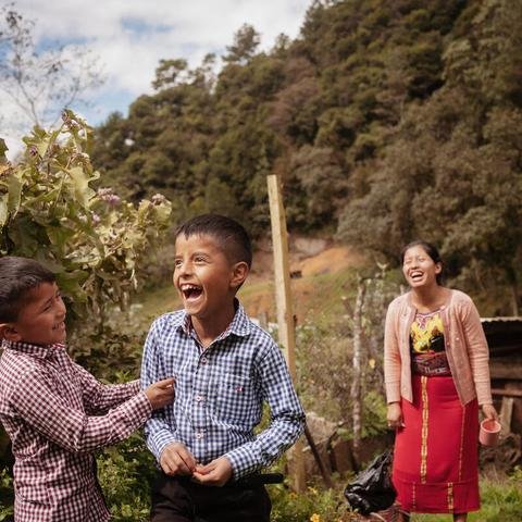 Brothers Edizon, seven, and TomÃ¡s, nine, with mum Rebeca, 27, at their farm in Quiche district, Guatemala