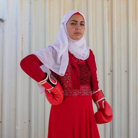 A portrait of Shehab*, 16, at a Girls Empowerment Centre, run by Shelter For Kids, in Zaatari Refugee Camp, Jordan.