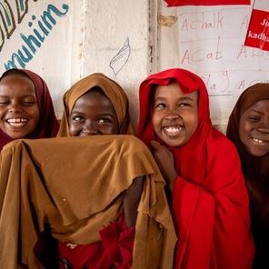 Ladan*, 10, and Sahra*, 10, with their friends at a Child Friendly Space in Puntland, Somalia